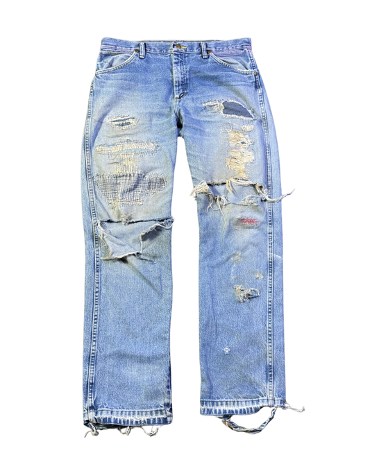 Vintage straight cut denim scabbed destroyed